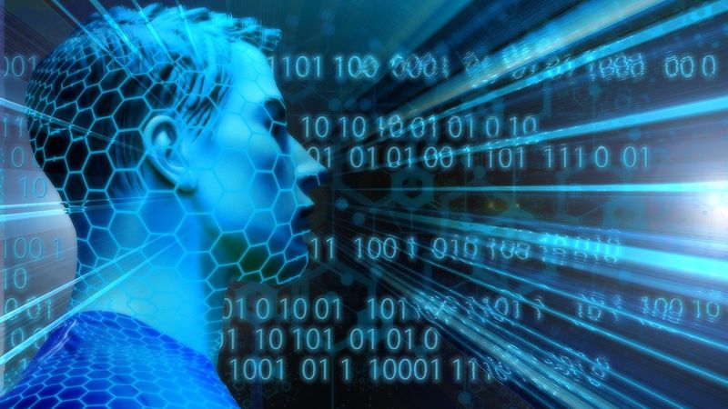 Ein menschliches Profil in blauer Tönung, umgeben von Binärcode und digitalen Elementen, die Technologie und Digitalisierung symbolisieren.