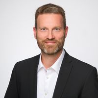 Porträtfoto von André Gesellchen, Leitung Programm-Management