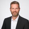 Porträtfoto von André Gesellchen, Leitung Programm-Management