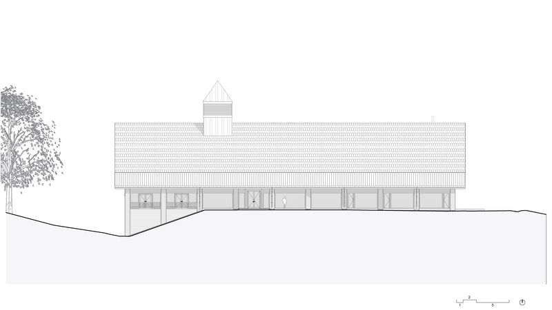 Clubhaus Golf Saint Apolliniare: Südfassade. Foto: DeAarchitectes