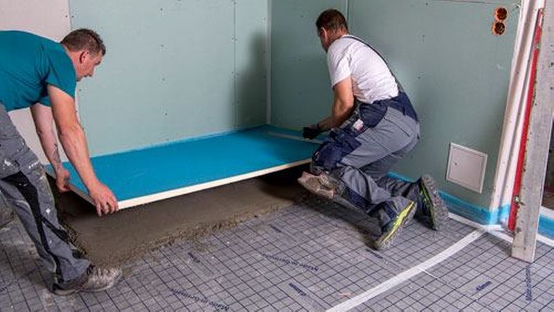 Einbau eines Duschboards.