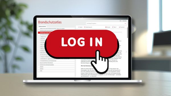 Ein Laptop auf einem Tisch mit einem großen roten "Log In" Button auf dem Bildschirm.